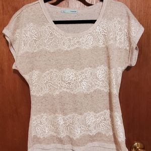 Medium sized cream colored dress shirt.